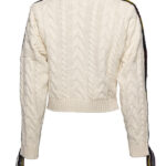 CABLE KNIT WITH JACQUARD RIBBONS AND TASSELS