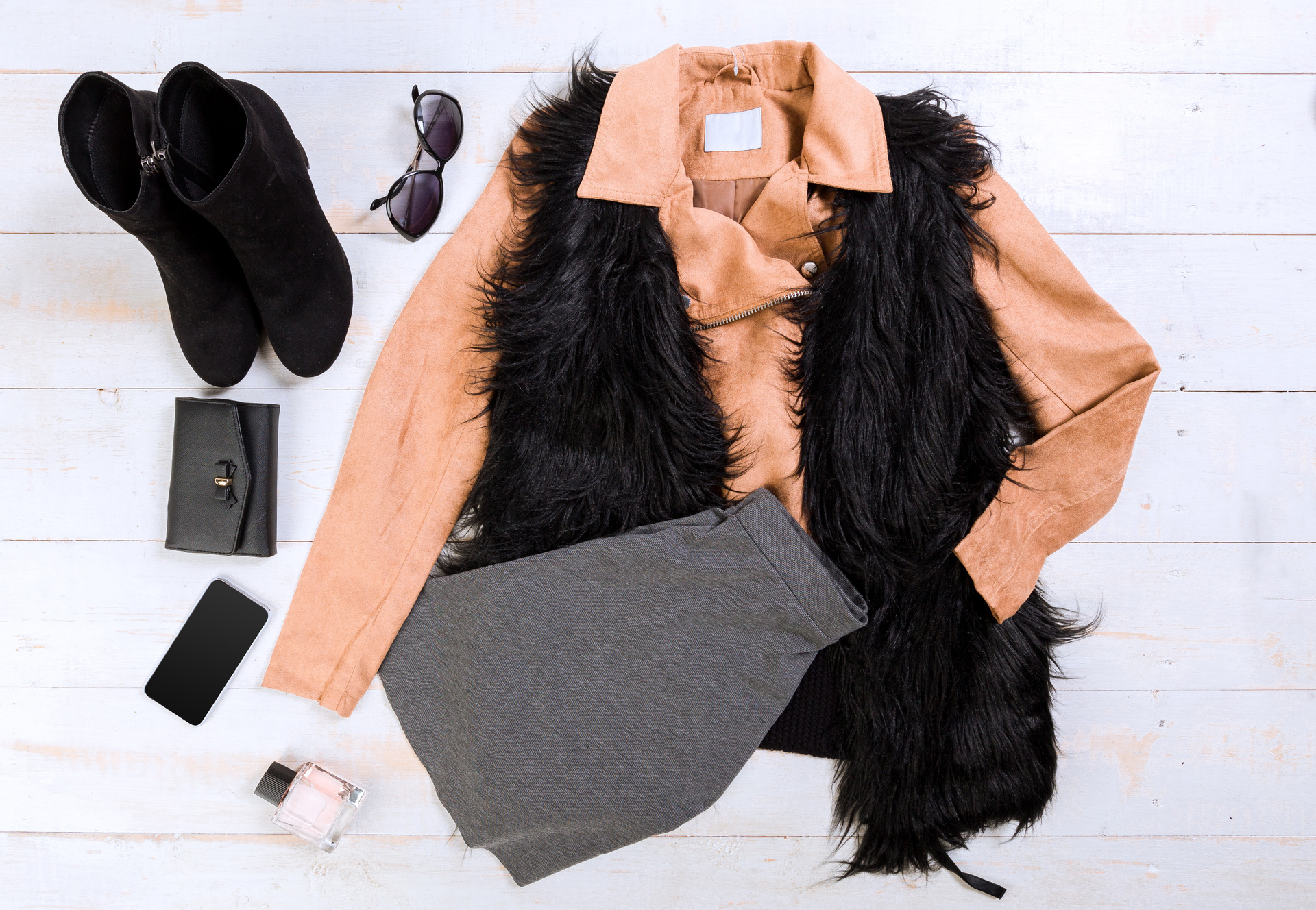 Sustainable Luxury Fashion: How to Build an Eco-Conscious Designer Wardrobe Overhead view of woman's casual outfits